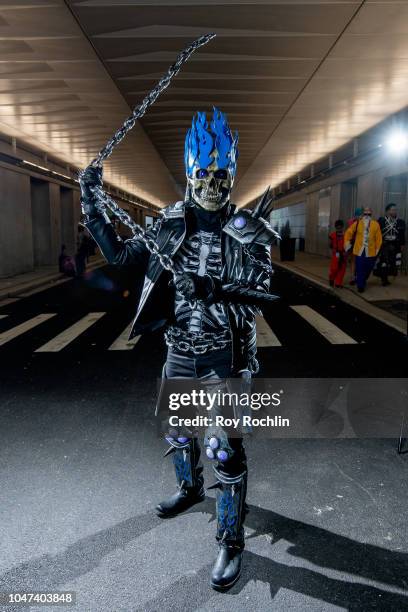 Fan cosplays as Ghost Rider form the DC Universe during the 2018 New York Comic-Con at Javits Center on October 7, 2018 in New York City.