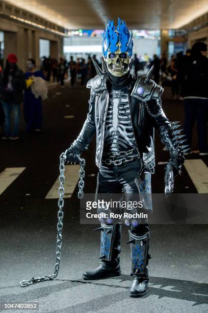 Fan cosplays as Ghost Rider form the DC Universe during the 2018 New York Comic-Con at Javits Center on October 7, 2018 in New York City.