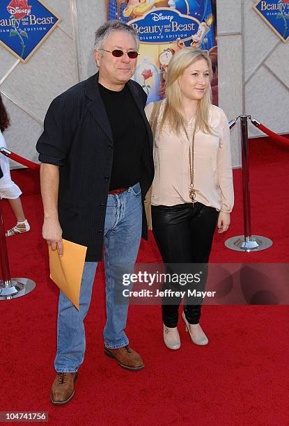 October 02: Alan Menken, composer with daughter Anna arrive at Walt Disney Studios Beauty and The Beast Sing-Along at the El Capitan Theatre on...