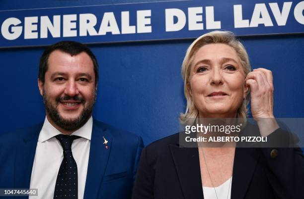 Italy's Interior Minister, Matteo Salvini and leader of France's far-right National Rally party, Marine Le Pen pose prior to attending a debate on...