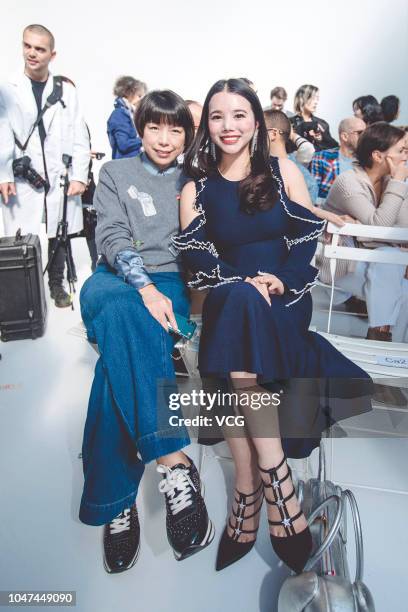 Vogue China Editor in Chief Angelica Cheung and fashion investor Wendy Yu attend the Thom Browne show as part of the Paris Fashion Week Womenswear...