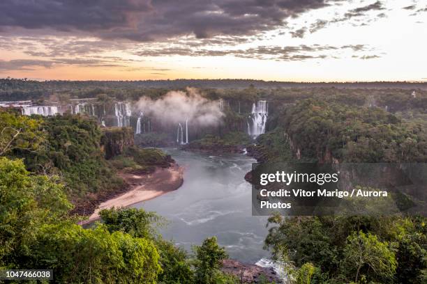 iguazu falls at dusk, parana, brazil - iguassu falls stock pictures, royalty-free photos & images