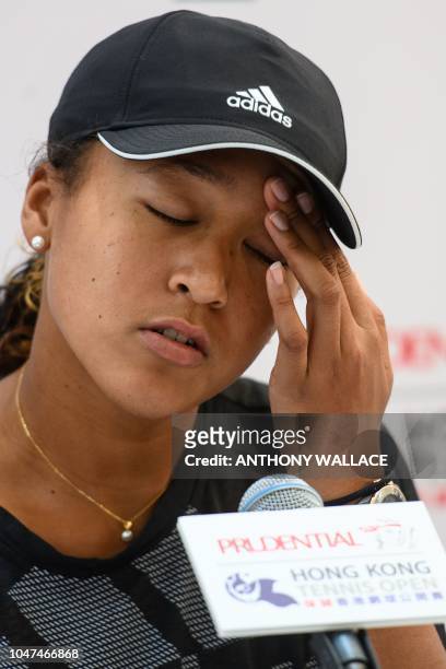 Naomi Osaka of Japan gestures during a press conference at the Hong Kong Open tennis tournament on October 8, 2018.
