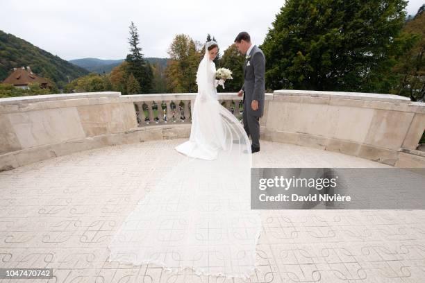 Prince Nicholas of Romania and Princess Alina of Romania pose on the balcony at Casino of Sinaia on September 30, 2018 in Sinaia, Romania.