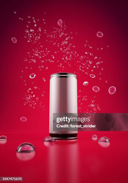 tonic can on red background - soft drink can stock pictures, royalty-free photos & images