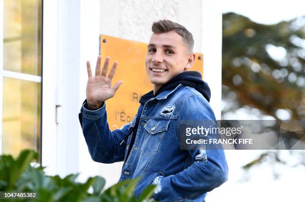 French defender Lucas Digne arrives at France's national football team training base in Clairefontaine en Yvelines on October 8 for the team's...