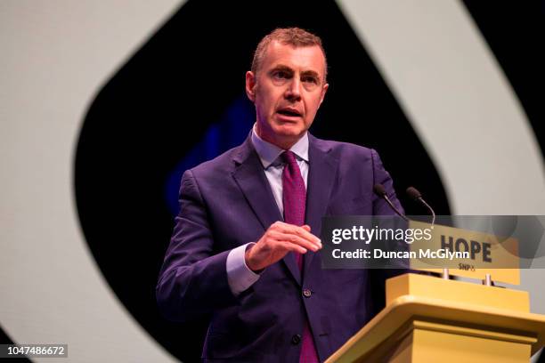 Adam Price leader of Plaid Cymru makes his keynote speech at the 84th annual SNP conference at the Scottish Exhibition and Conference Centre at SECC...