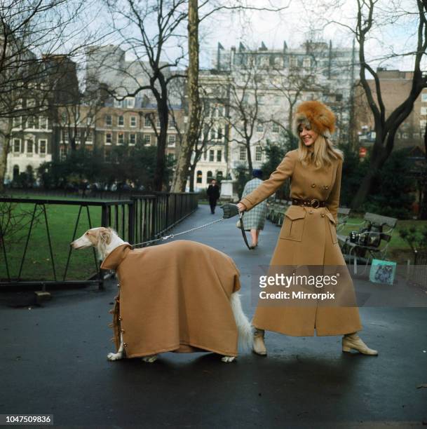 The first maxi coat for dogs gets its maiden outing in London with model Vicki Hodge and three-year-old Borzoi Sneshok Sokolova . Vicki's coat is by...