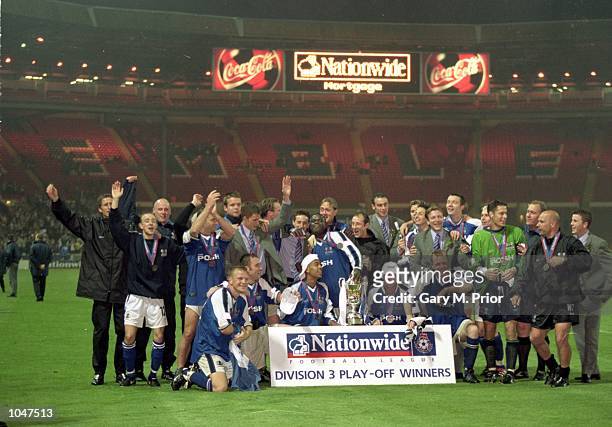 The Peterborough team celebrate after the Division 3 Play - Off Final against Darlington at Wembley Stadium,London,England.Peterborough won the match...