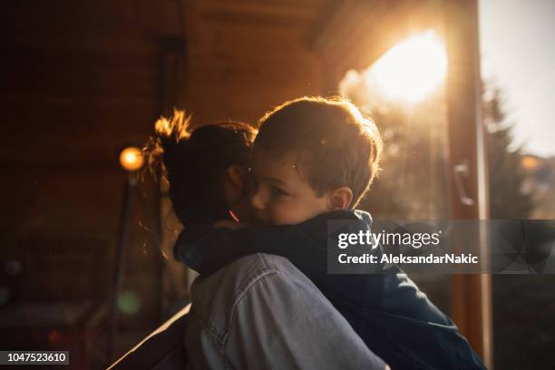 loving my boy - family hug stock pictures, royalty-free photos & images