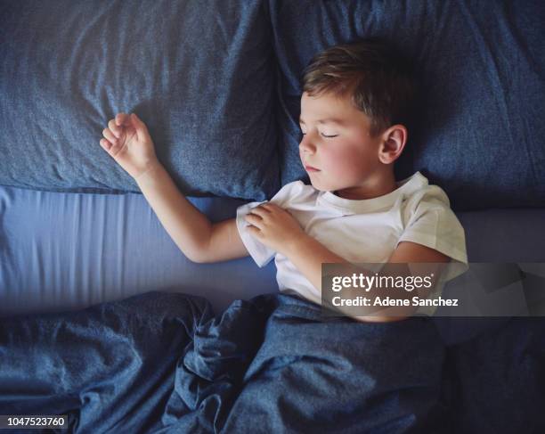 Rest Child 12,166 Child Sleeping On Bed Stock Photos, High-Res Pictures, and ...