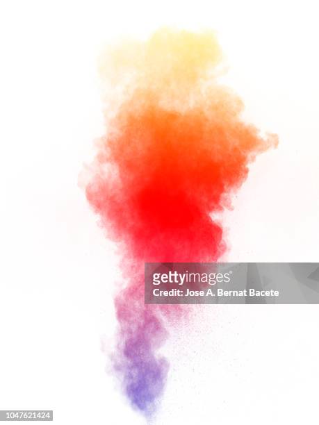 full frame of forms and textures of an explosion of powder and smoke of color red and purple on a white background. - fireworks on white stockfoto's en -beelden