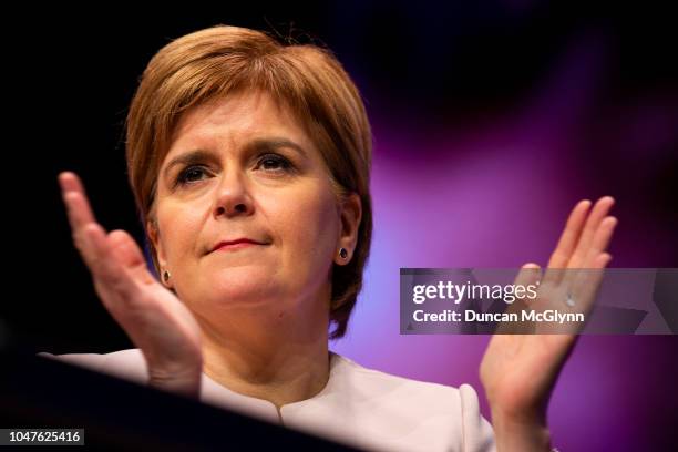 First Minister of Scotland Nicola Sturgeon watches Keith Brown MSP, Depute Leader of the SNP make his keynote speech at the 84th annual SNP...