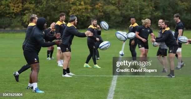Wasps warm up during the Wasps training session held on October 8, 2018 in Coventry, England.
