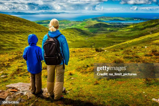 woman and boy hiking in ireland - ring of kerry ireland stock pictures, royalty-free photos & images