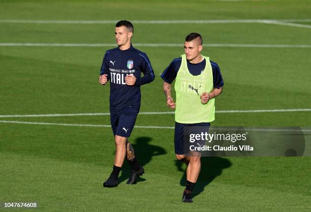 Sebastian Giovinco and Marco Verratti of Italy looks onduring a Italy training session at Centro Tecnico Federale di Coverciano on October 8, 2018 in...