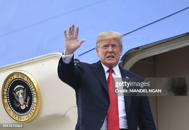 President Donald Trump arrives at Orlando International Airport in Orlando, Florida on October 8, 2018.