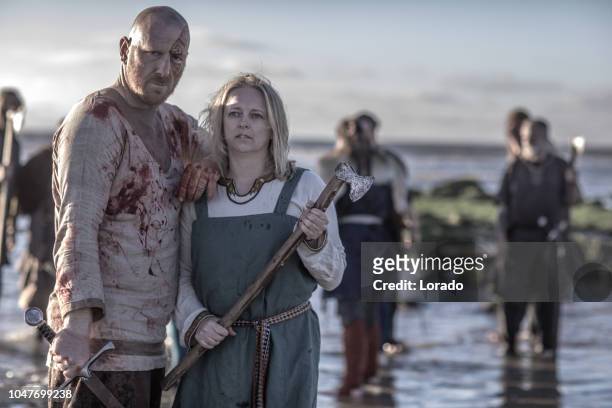 male and female viking couple - france v scotland stock pictures, royalty-free photos & images