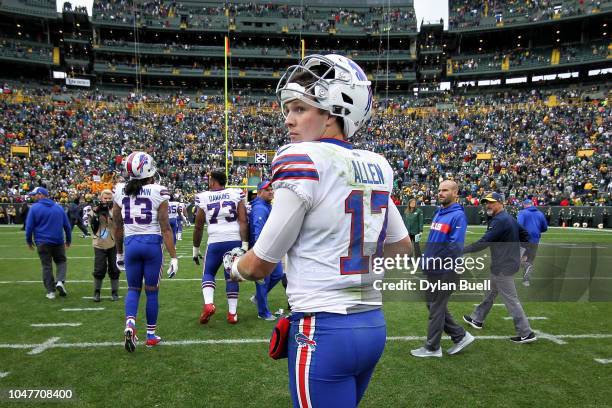 Josh Allen of the Buffalo Bills walks off the field after losing to the Green Bay Packers 22-0 at Lambeau Field on September 30, 2018 in Green Bay,...