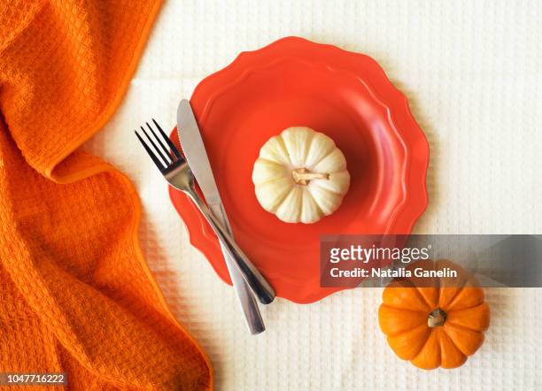 pumpkins for dinner - miniature pumpkin stock pictures, royalty-free photos & images