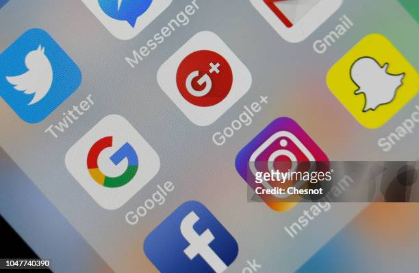 In this photo illustration, the social medias applications logos, Twitter, Google, Google+, Gmail, Facebook, Instagram and Snapchat are displayed on...