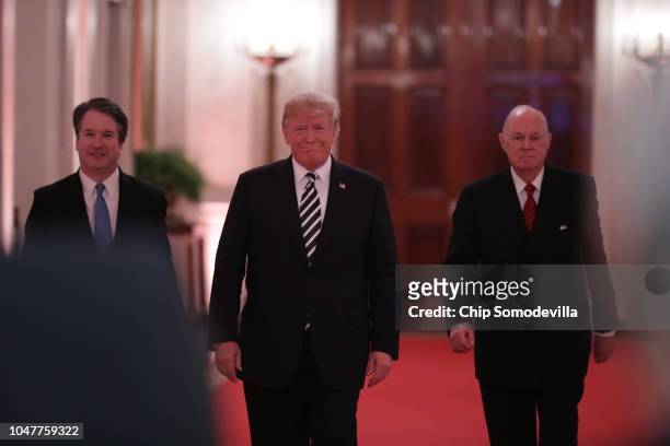 Supreme Court Justice Brett Kavanaugh, President Donald Trump and retired Justice Anthony Kennedy arrive for Kavanaugh's ceremonial swearing in in...