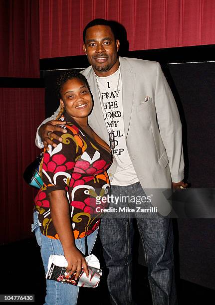 Actor Lamman Rucker poses with a fan after the premiere screening of "N-Secure" at Atlantic Station on September 30, 2010 in Atlanta, Georgia.