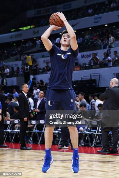 Ding Yanyuhang of the Dallas Mavericks warms up before the 2018 NBA China Games match between the Dallas Mavericks and the Philadelphia 76ers at...