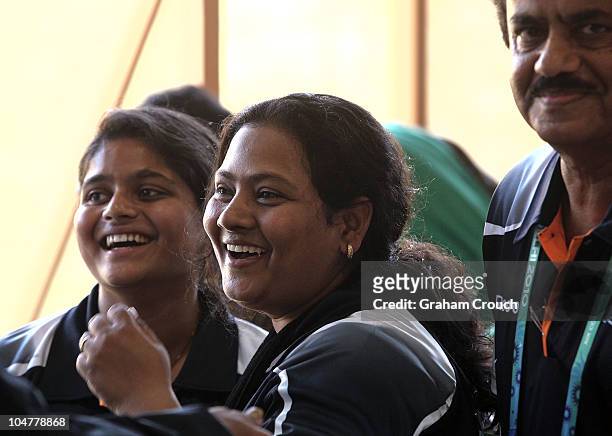 India's victorious 25m Pairs Pistol team of Rahi Sarnobat and Anisa Sayyed smile after their last gasp victory over Australia for the gold medal at...