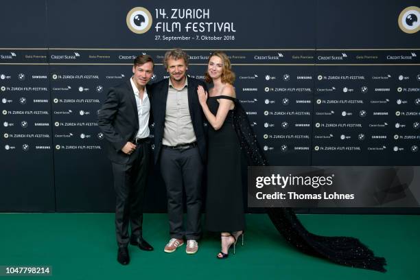 David Kross, Marcus H. Rosenmueller and Freya Mavor attend the 'Trautmann' premiere during the 14th Zurich Film Festival at Festival Centre on...