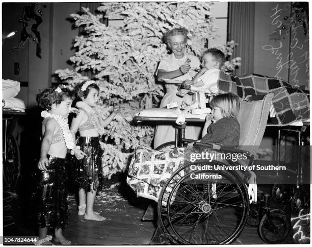 Orthopedic Hospital Christmas party, 17 December 1953. Ingrid Sargis -- 4 years;Anna Sargis -- 6 years;Mrs Jess S Reeder;Larry Howard -- 8 years;Mary...