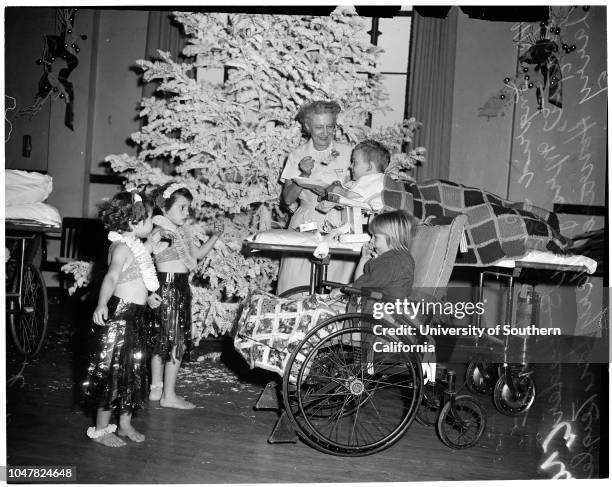 Orthopedic Hospital Christmas party, 17 December 1953. Ingrid Sargis -- 4 years;Anna Sargis -- 6 years;Mrs Jess S Reeder;Larry Howard -- 8 years;Mary...