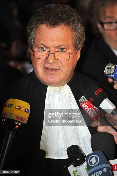 Jean Veil, a lawyer for Societe Generale SA, speaks to reporters as he exits a courthouse in Paris, France, on Tuesday, Oct. 5, 2010. Former Societe...