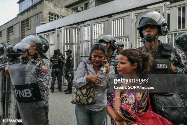 Family members of Fernando Albán seen mourning outside the headquarters of the Bolivarian National Intelligence Service. Deputies of the national...