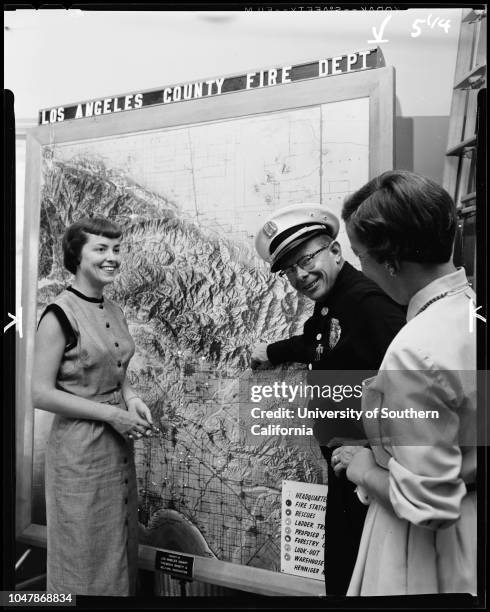 Los Angeles County Fire Station Number 97 in Azusa, 4 November 1956. Mrs Donald Borthwick;Mrs Frank Hamp;Captain Alan Fibson.;Caption slip reads:...