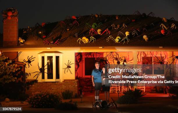 Don and Kathy Kane have been decorating their Bibiana Way house with more than 300 store-bought and handmade spiders for Halloween in Upland.