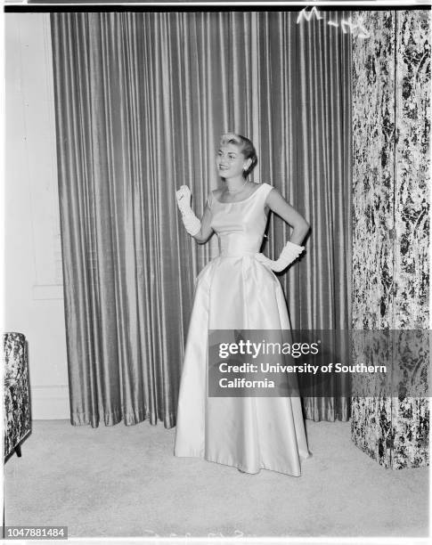 Opera Fashions, 19 September 1957. Model Gowns for Opera from Helga's Dress Shop;Edith Small Shop;Peggy Hunt Shop. .;Caption slip reads:...