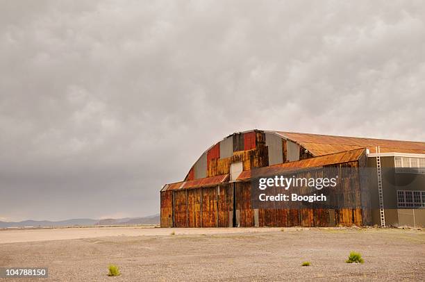 old american history military airplane hangar in remote western usa - wendover stock pictures, royalty-free photos & images