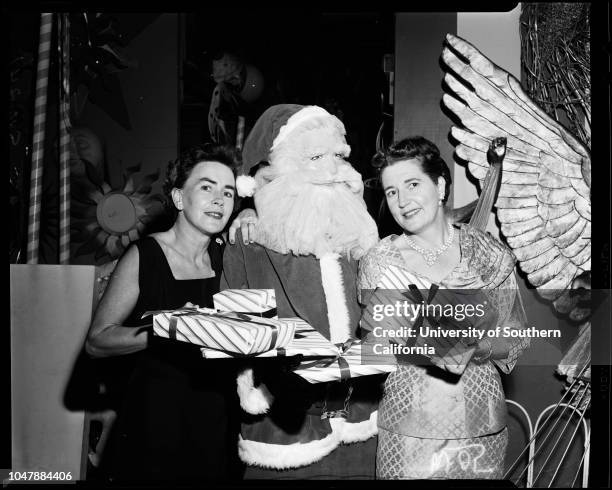 St. Anne's Hospital Guild -- Bazaar, 5 November 1957. Mrs Frank Koeller;Mrs Charles Getchell;Miss Reilly Mullin;Master Pat Hawrahan;Mrs Eugene...