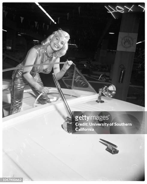 Boat show at Great Western Livestock Building, 13 February 1958. Juli Relding ;Derith Lindsay -- 17 years. Dorene Porter .;Caption slip reads:...