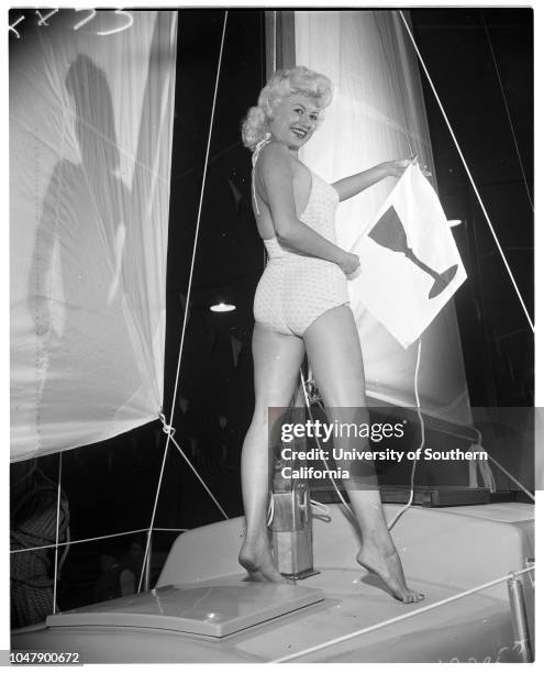 Boat show at Great Western Livestock Building, 13 February 1958. Juli Relding ;Derith Lindsay -- 17 years. Dorene Porter .;Caption slip reads:...