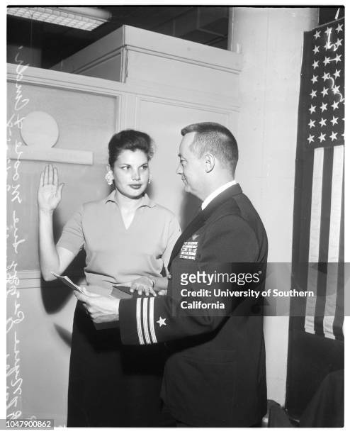 Indian navy nurse recruit, 12 February 1958. Peggy Sue Moore ;Commander Charles A Skinner .;Caption slip reads: 'Photographer: Mitchell. Date: ....