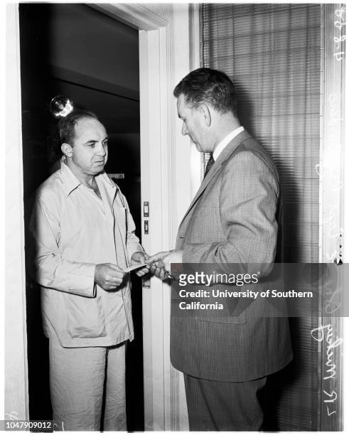 Cohen subpoena in death of Stompanato, 17 May 1958. Mickey Cohen;Captain Ray Borders .;Caption slip reads: 'Photographer: Gaze. Date: . Reporter:...