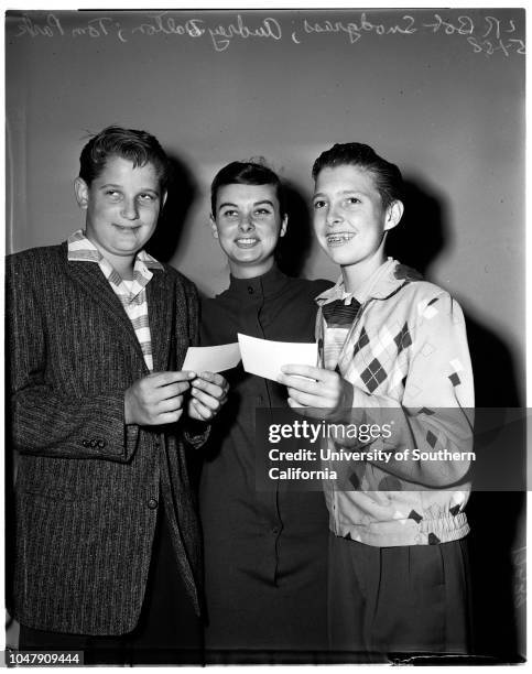 Examiner carriers with movie star, 1 May 1958. Audrey Dalton ;Bob Snodgrass;Tom Park. .;Supplementary material reads: 'From: Pete Latsis, Fox West...