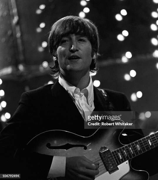 John Lennon performing the new single 'Paperback Writer' with The Beatles on the BBC TV music show 'Top Of The Pops', 16th June 1966.