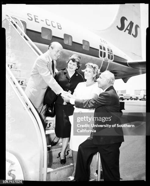 Ormandy arrival at International Airport, 6 July 1958. Eugene Ormandy;Mrs Eugene Ormandy;Wynn Rocamora;Hilda Gueden. ..