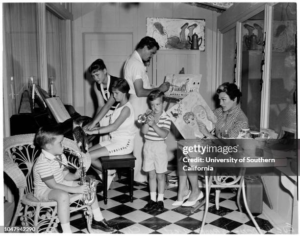 Eve Arden & Family -- Pictorial living. 7 July 1959. Eve Arden;Brooks West;Duncan West, 6;Liza West, 14;Connie West, 11;Doug West, 4.;Caption slip...