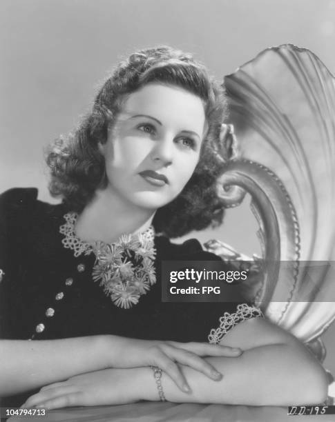 Atress and singer Deanna Durbin at the age of 15, circa 1937.