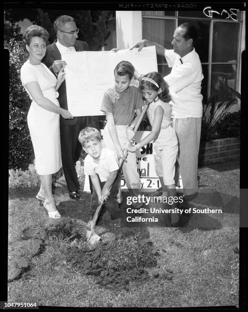 Fall-out shelter ground breaking at home of Paul Miller 10716 Esther Avenue in WLA, 23 June 1960. Mr and Mrs Paul Miller;Bobby Miller -- 4...