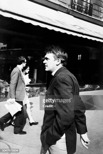 Photo taken on October 14, 1973 shows Czech-born French writer Milan Kundera walking in Paris.